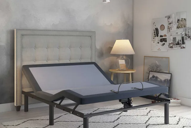BedTech BT3000 adjustable bed base with the head and foot raised in a bedroom