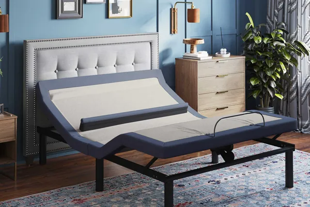 BedTech BT6500 adjustable bed base with the head, foot and pillow tilt raised in a bedroom
