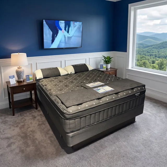 Diamond pillow top mattress in charcoal gray in a showroom bedroom